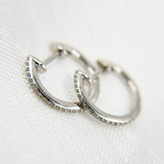 HP115334. 14K Solid Gold Diamond Huggies